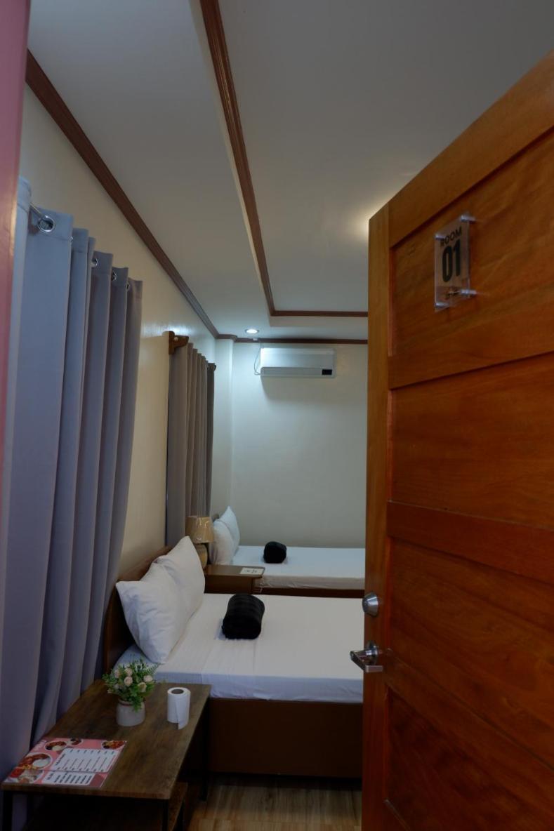 Jun'S Inn Oslob Bagian luar foto