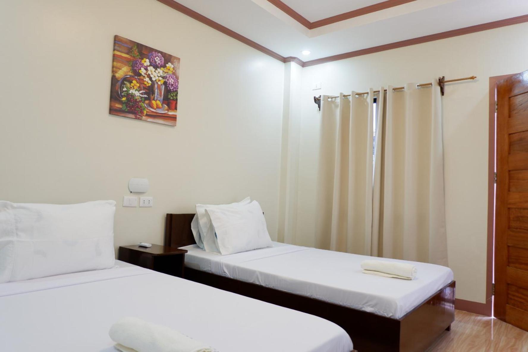 Jun'S Inn Oslob Bagian luar foto